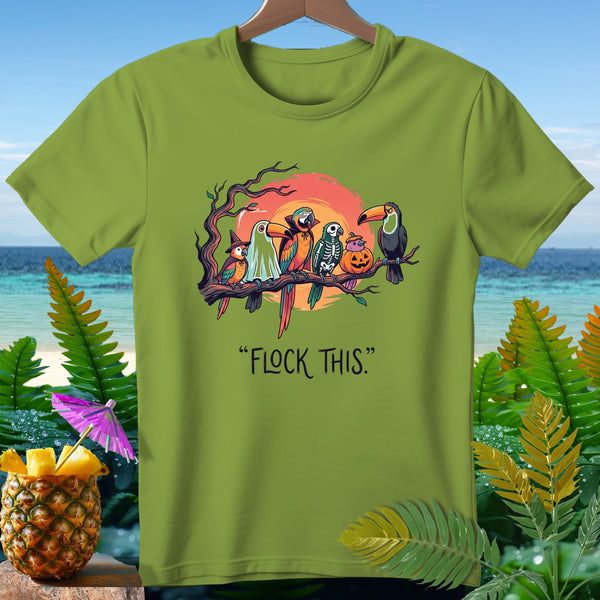 Parrots and toucan dressed for Halloween on a branch with text "FLOCK THIS."