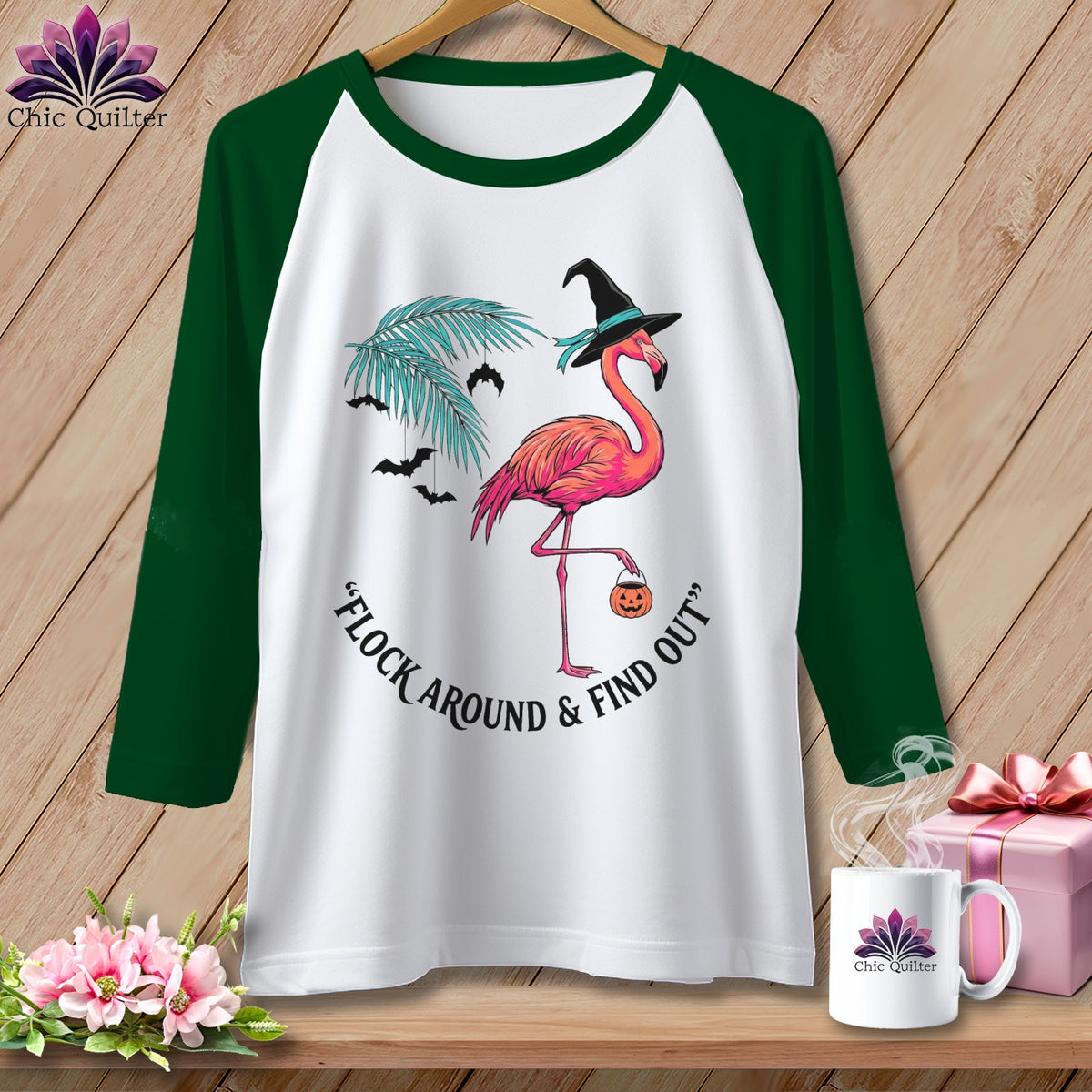 Green sleeve shirt with flamingo, witch hat, bats, and Halloween text.