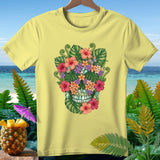 Yellow t-shirt featuring a floral skull design with butterflies and tropical foliage.