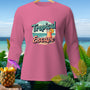 Pink long-sleeve shirt with "Tropical Escape" text and tropical drink graphic.