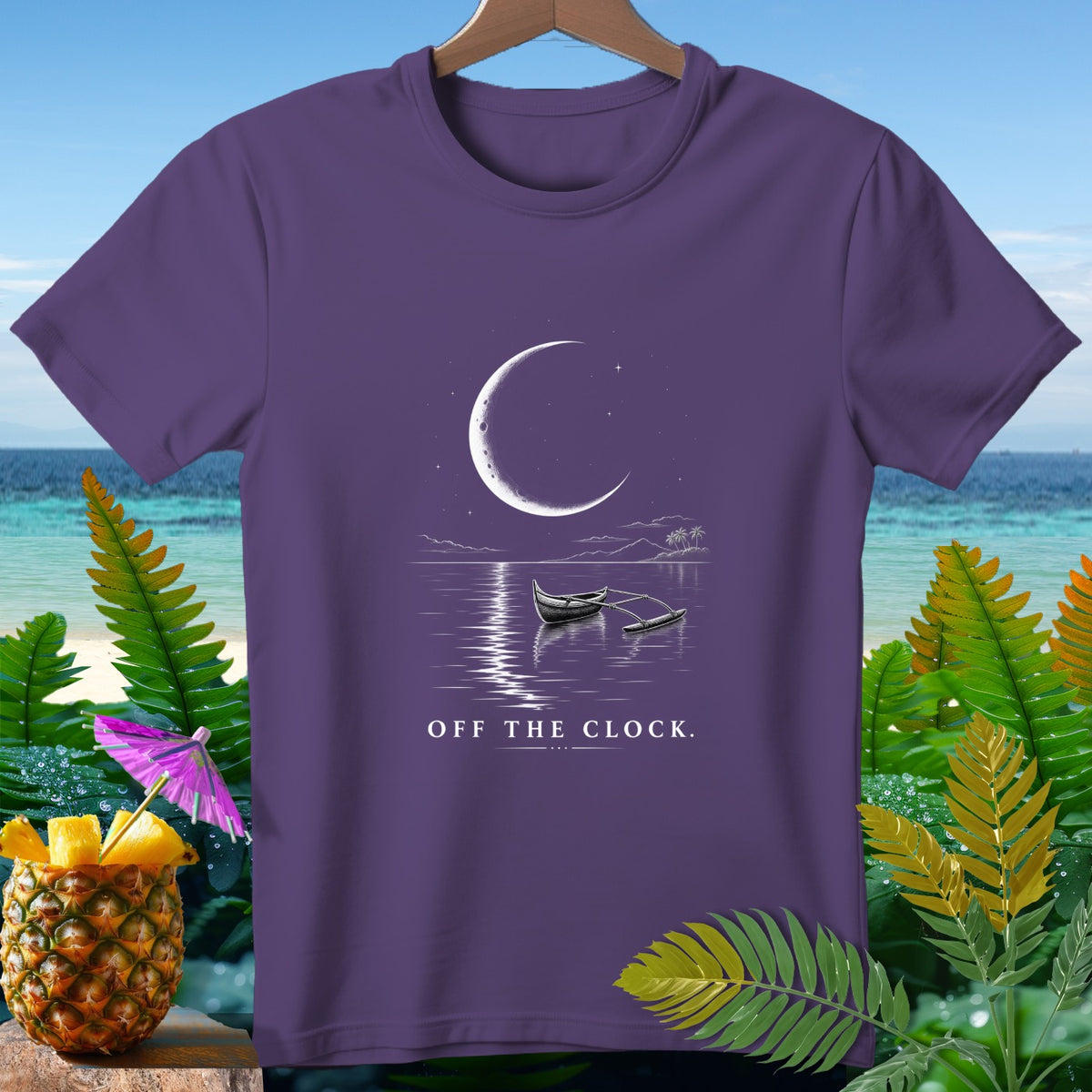 Purple t-shirt with crescent moon, boat on water, and text "OFF THE CLOCK."