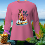 Pink long-sleeve shirt with kangaroo paddleboarding and text 