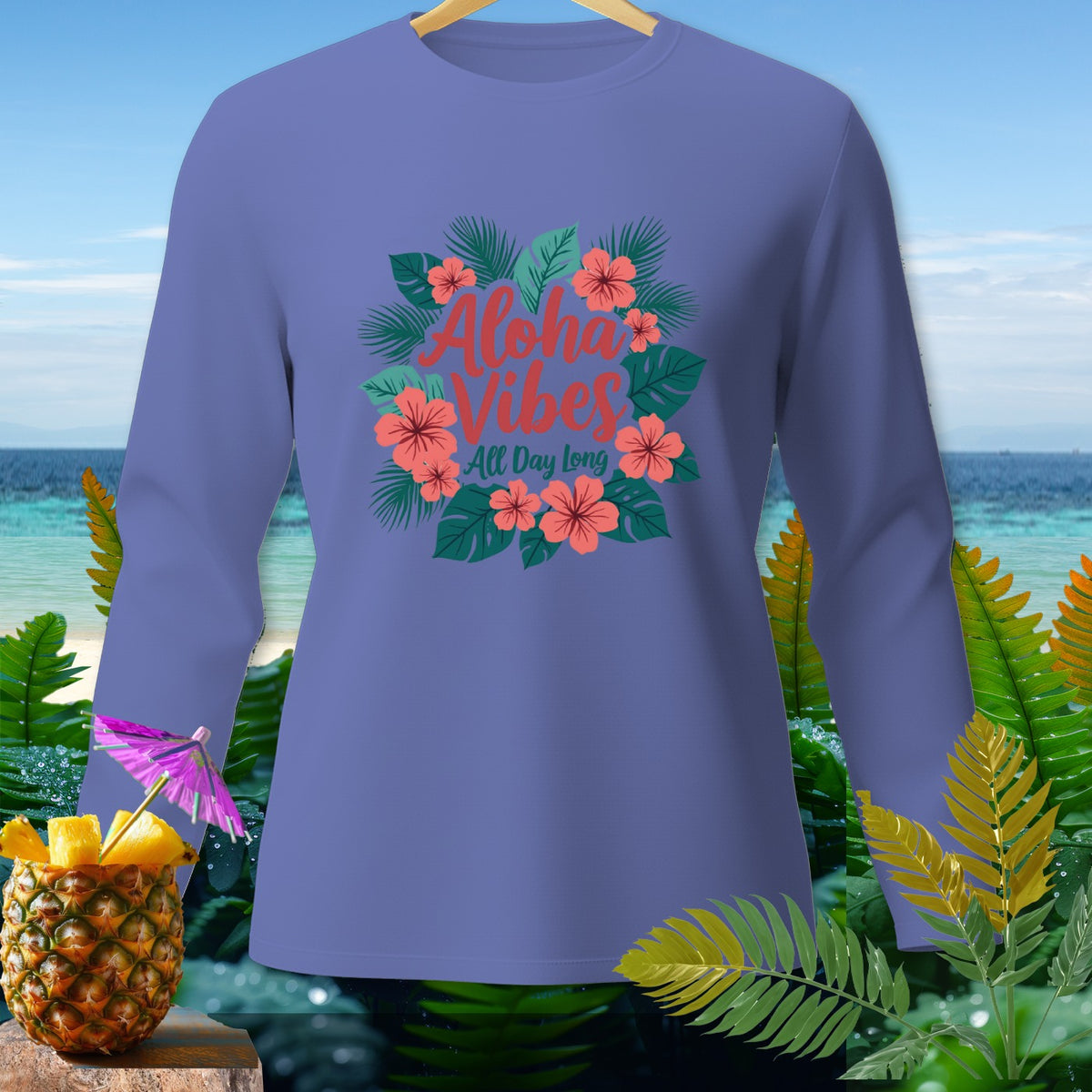 Purple long-sleeve shirt with "Aloha Vibes All Day Long" text and floral design.