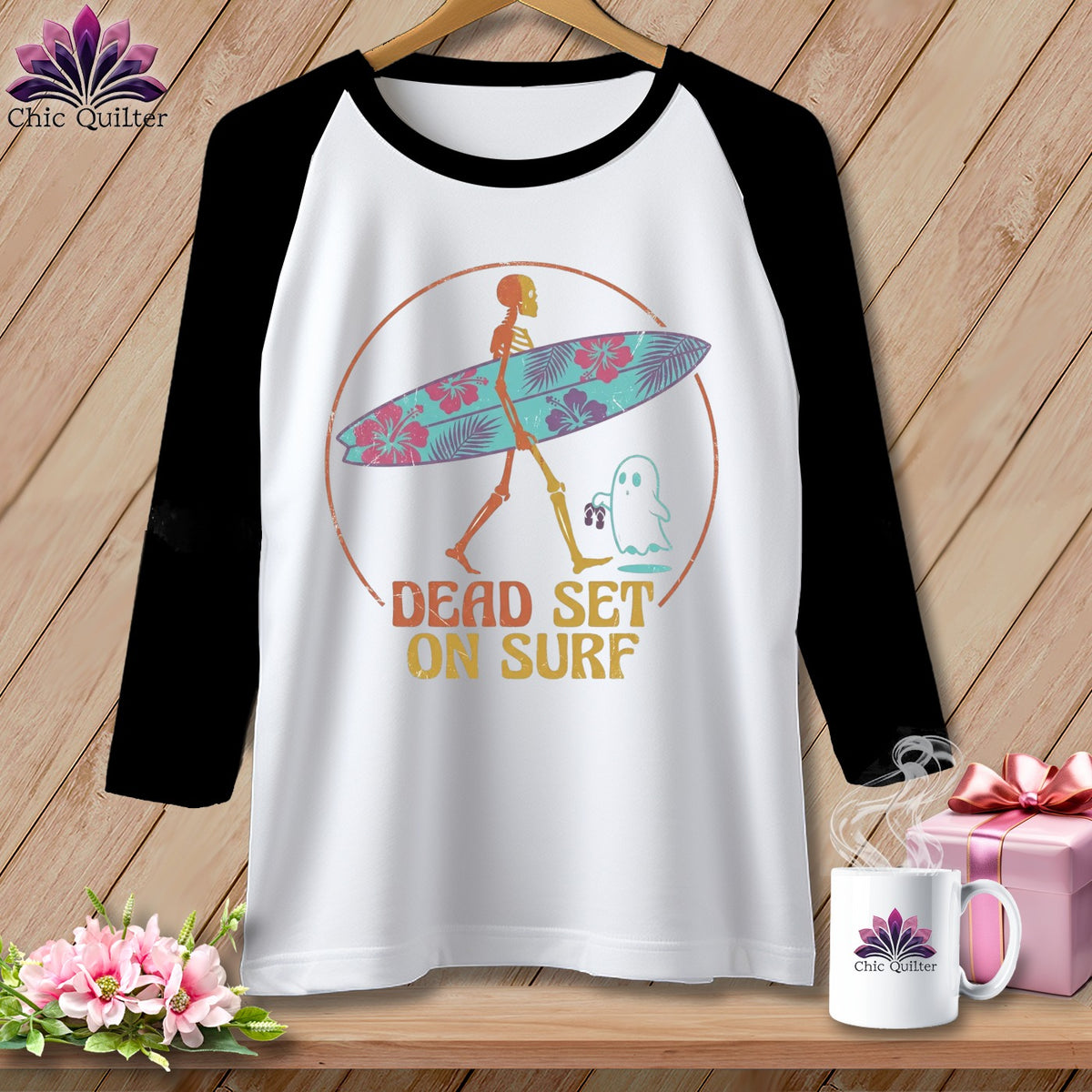 Raglan shirt with skeleton, ghost, and "Dead Set On Surf" text.