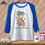 Raglan shirt with skeleton, ghost, palm tree, and "VACATION EMERGENCY" text.