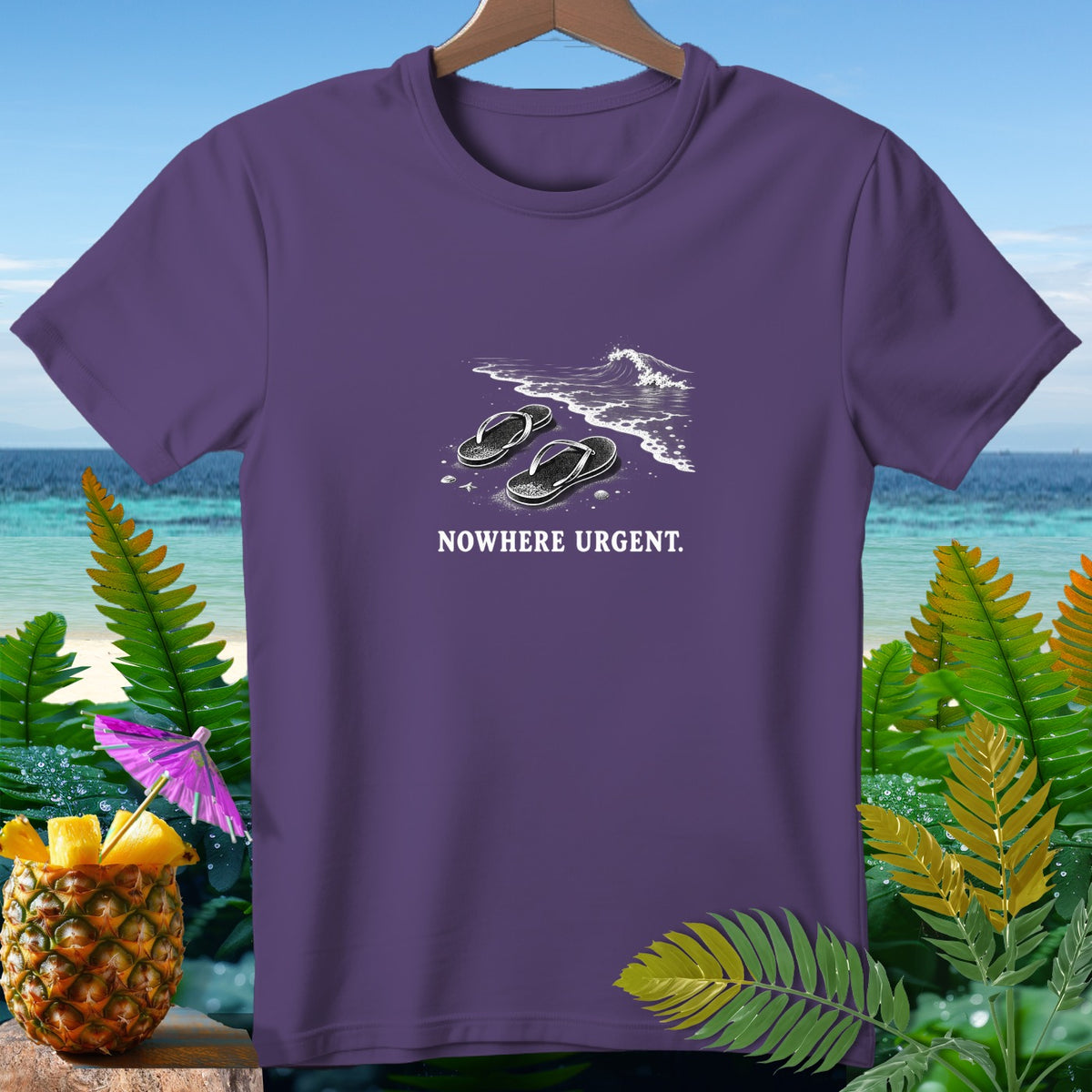 Purple t-shirt with graphic of flip-flops on a beach and text "NOWHERE URGENT."