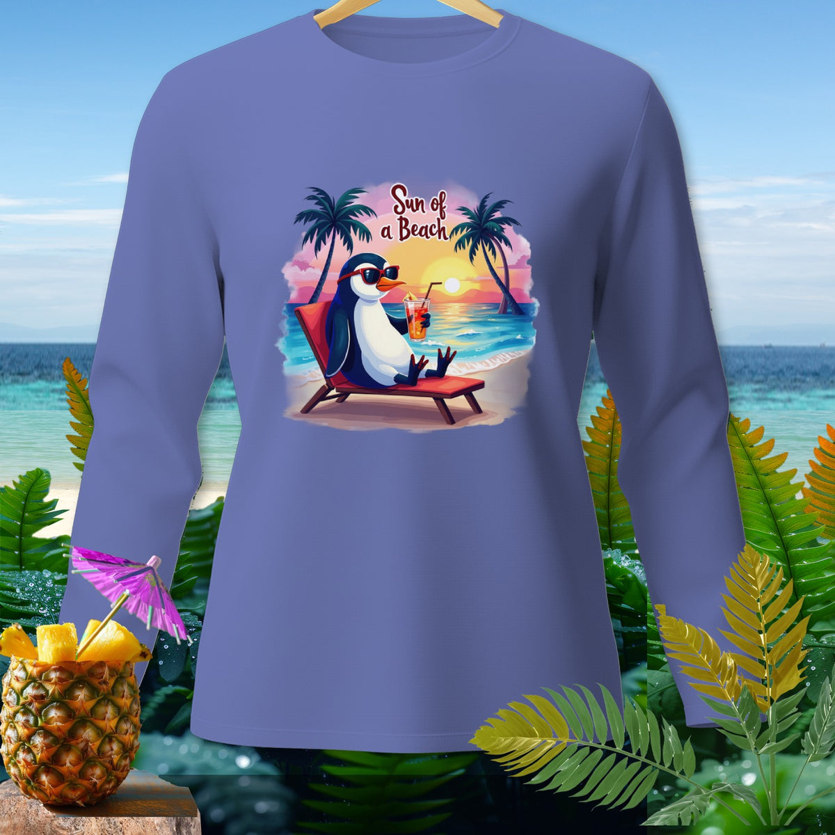 Penguin with sunglasses relaxes on a beach chair with a drink, text "Sun of a Beach."