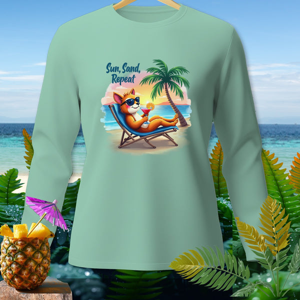 Light green long-sleeve shirt with "Sun, Sand, Repeat" text and a cartoon fox on a beach.