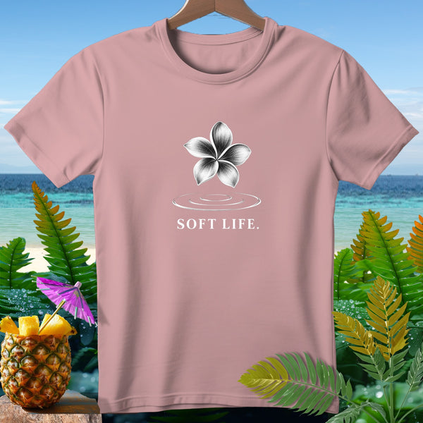 Pink t-shirt with a white plumeria flower and "SOFT LIFE." text.