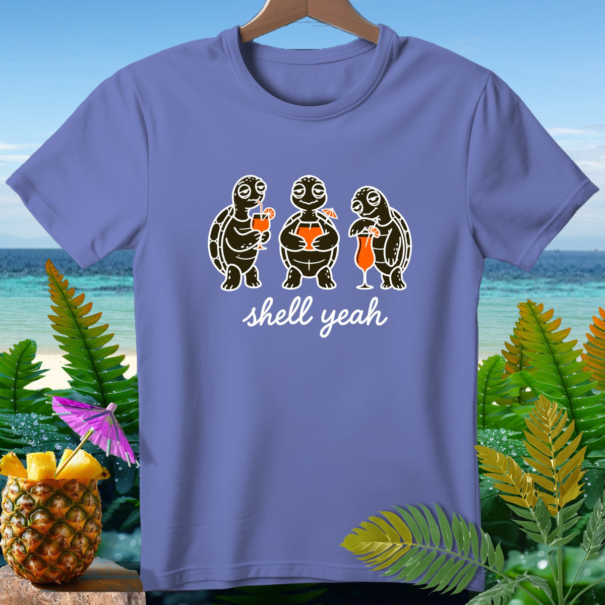 T-shirt with three cartoon turtles holding cocktails, with "shell yeah" text.