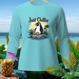 Light blue long-sleeve shirt with a penguin wearing sunglasses and 