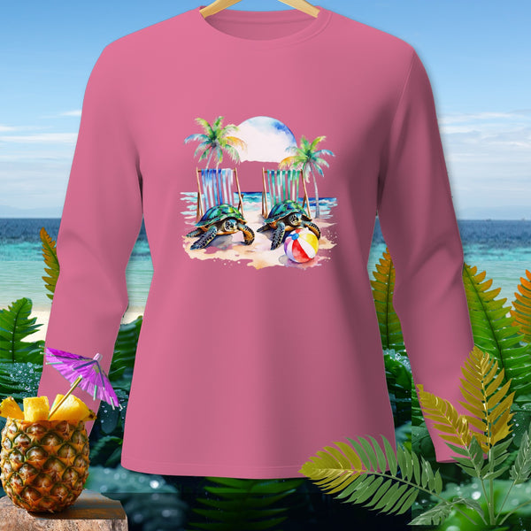 Pink long-sleeve shirt with two sea turtles and beach chairs graphic.