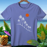 Purple t-shirt with white palm trees, orange sun, and tropical background.