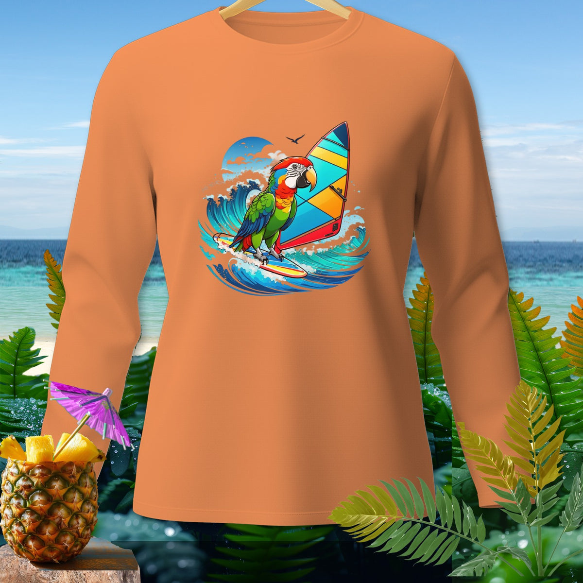Orange long-sleeve shirt with a parrot windsurfing on a wave graphic.