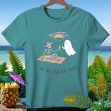 Skeleton with a ghost on a beach blanket, with text 