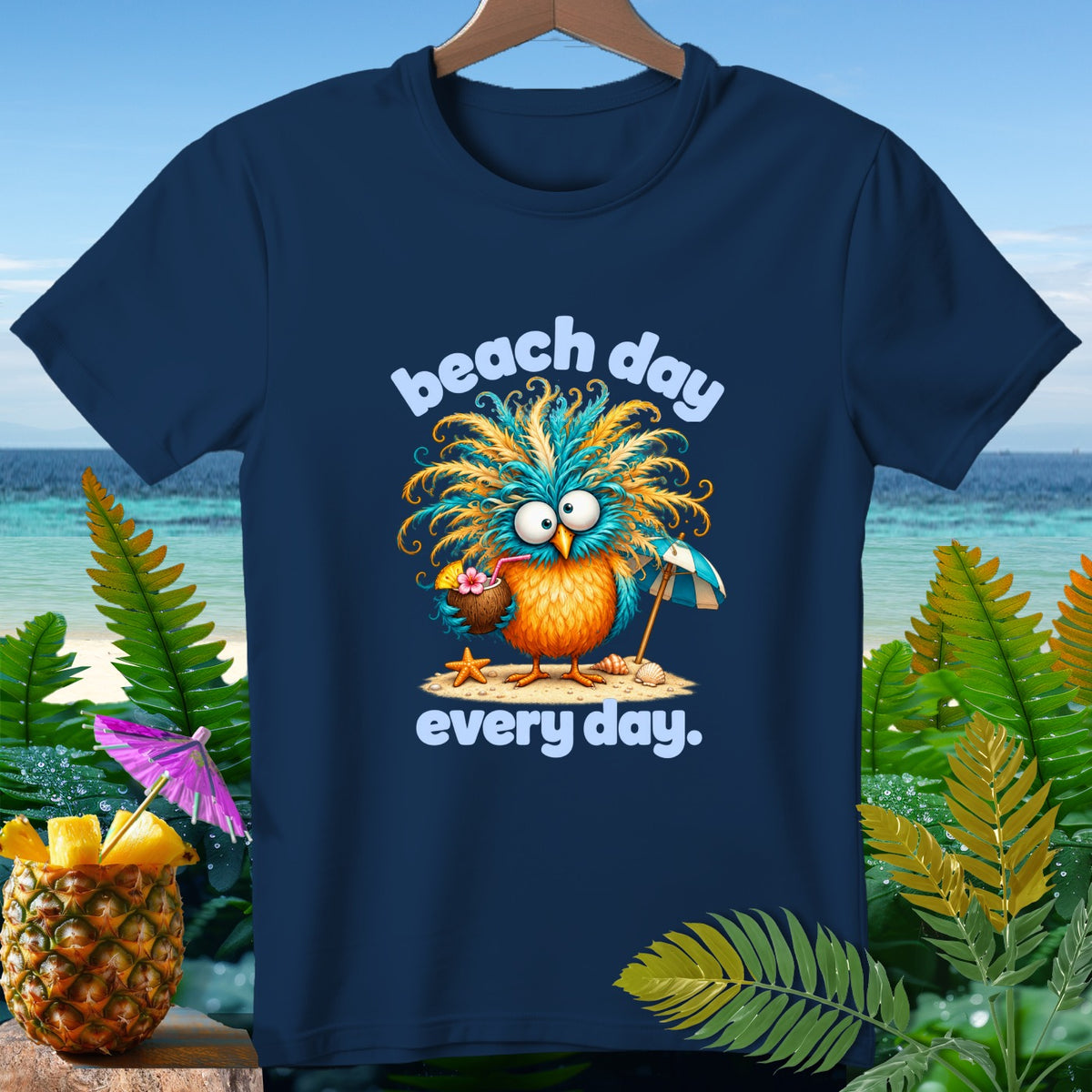 Navy t-shirt with a cartoon bird drinking from a coconut with text "beach day every day."