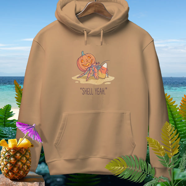 Tan hoodie with Halloween crab graphic and "SHELL YEAH." text.