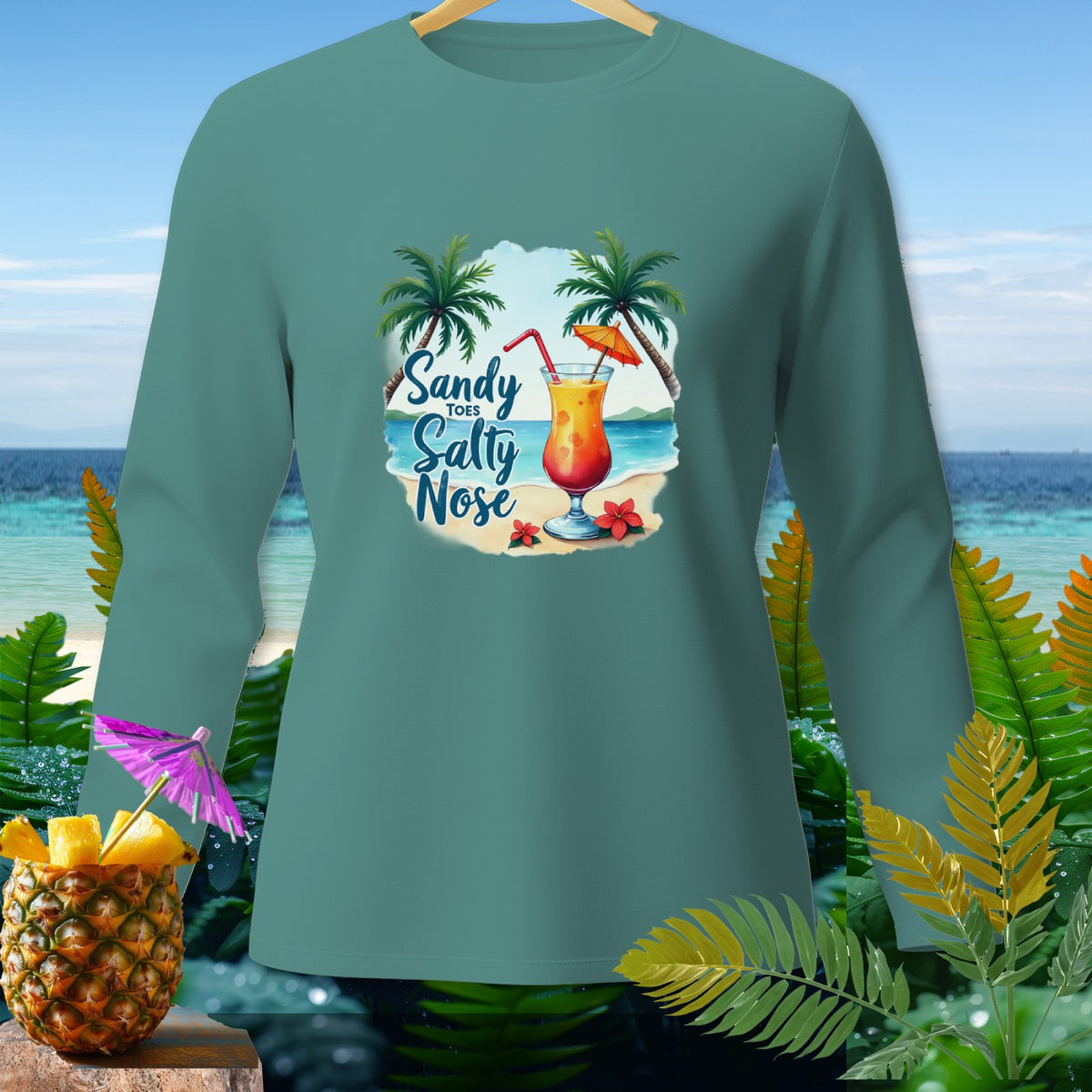 Teal long-sleeve shirt with "Sandy Toes Salty Nose" beach graphic.