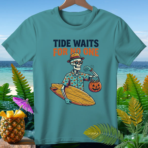 Skeleton wearing sunglasses and a hat holds surfboard and pumpkin candy bucket.