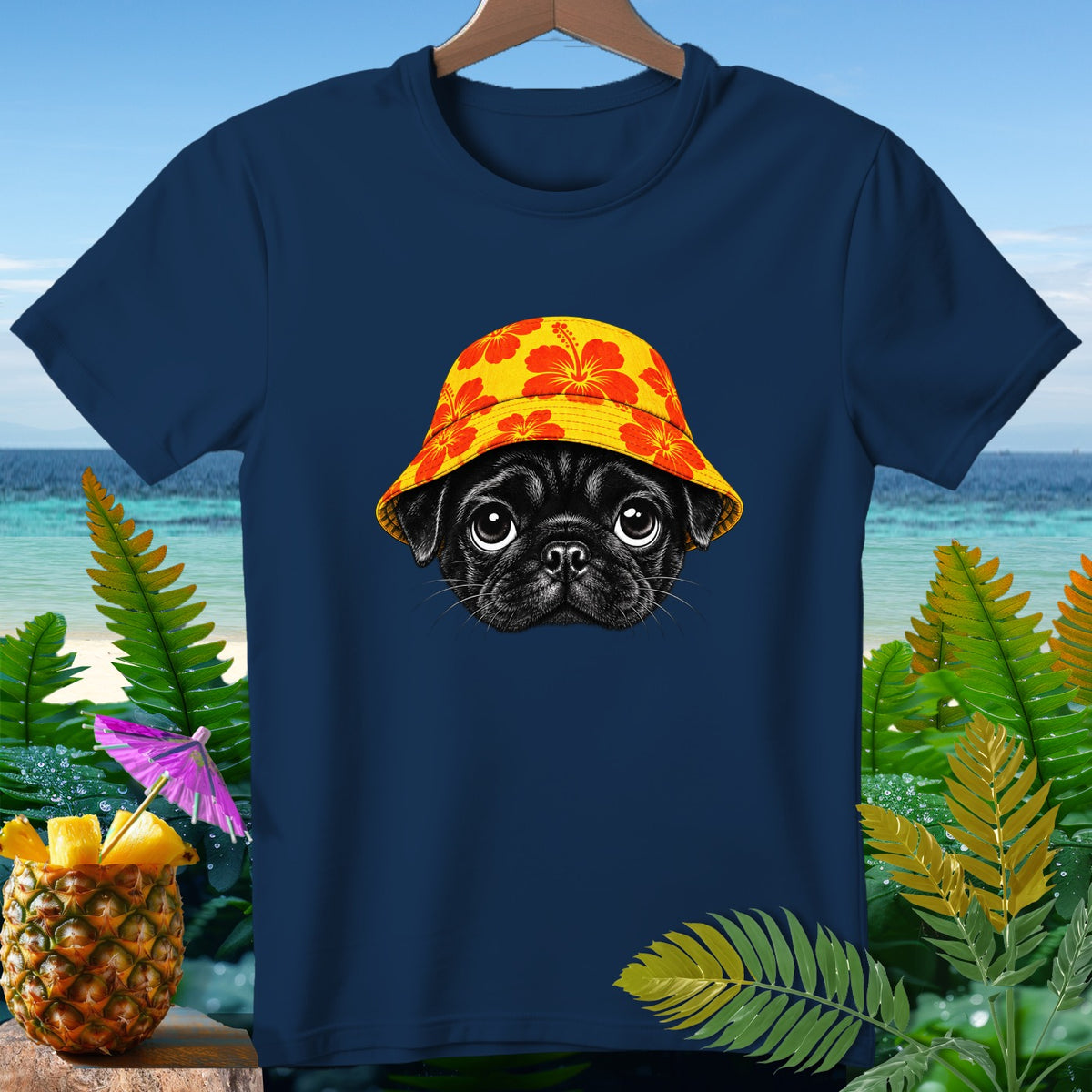 Navy t-shirt with a pug wearing a floral bucket hat and a tropical background.