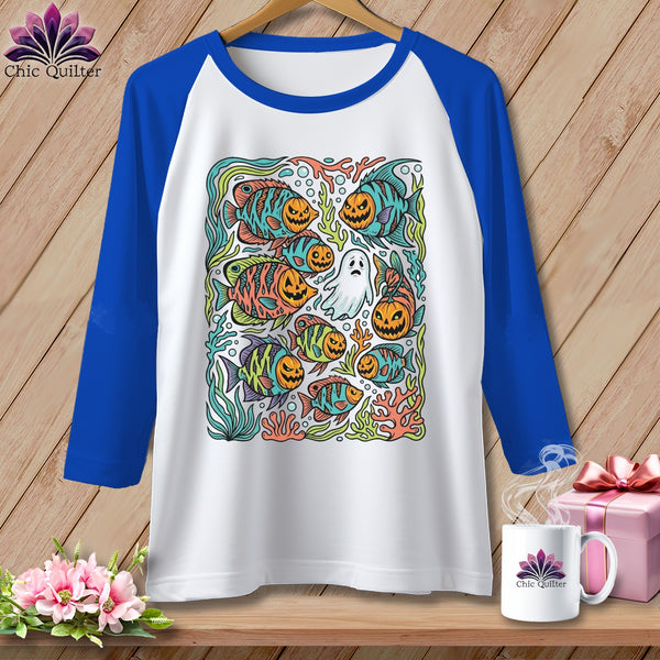 Raglan t-shirt with Halloween fish and ghost print and blue sleeves.