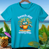 Turquoise t-shirt with cartoon bird holding a coconut drink, saying 
