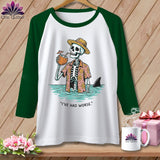 Green sleeve raglan shirt with skeleton in Hawaiian shirt drinking coconut and shark fin.