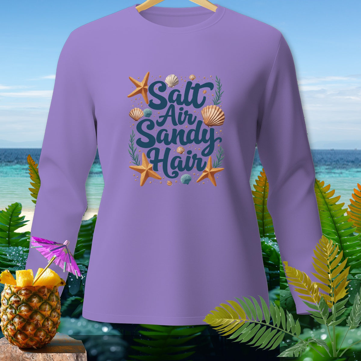 Purple long-sleeved shirt with "Salt Air Sandy Hair" text and beach graphics.