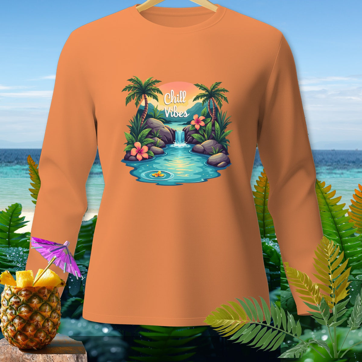Orange long-sleeve shirt with "Chill Vibes" graphic of a tropical waterfall.