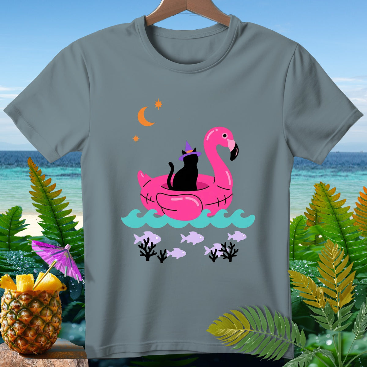 Black cat in witch hat on pink flamingo float with moon and stars.
