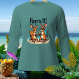 Two cartoon kangaroos relax on a beach, text 