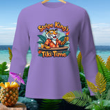 Long-sleeve shirt with a cartoon tiger holding a torch and tropical drink.