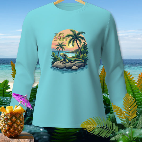 Long sleeve shirt with "Just Chillin" text and iguana on a tropical beach sunset graphic.