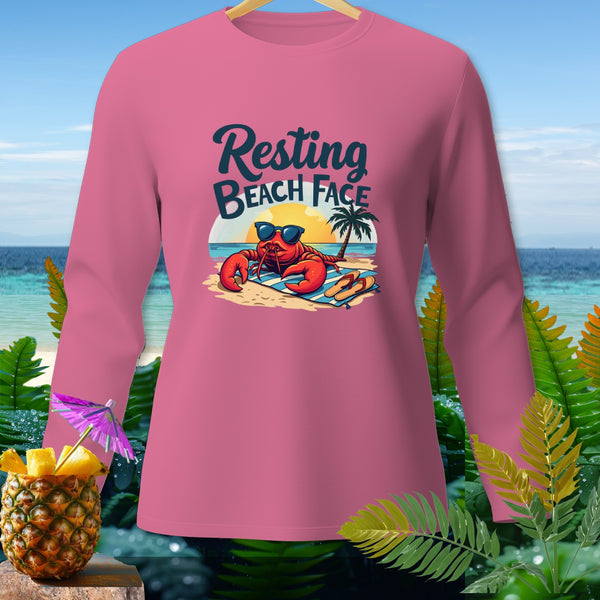 Pink long-sleeve shirt with a graphic of a lobster wearing sunglasses on a beach.