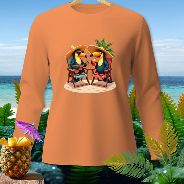Orange long-sleeve shirt with cartoon toucans playing ukulele and drinking cocktails on a beach.