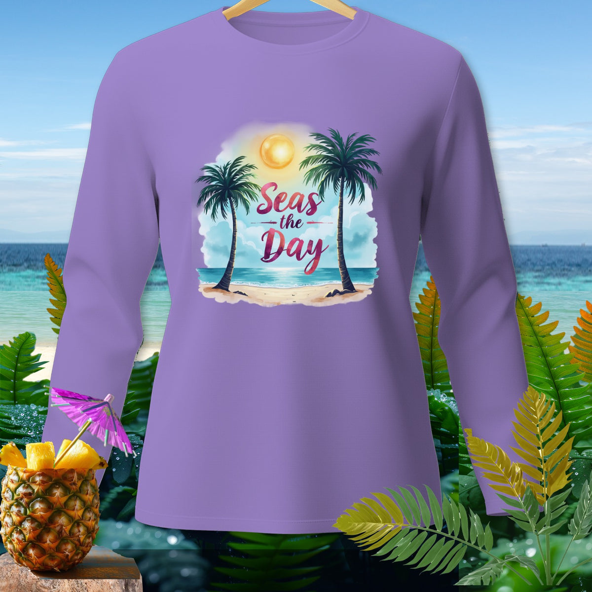 Purple long-sleeve shirt with "Seas the Day" tropical beach graphic.