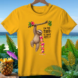 Yellow t-shirt with a sloth hanging from a branch and text that reads 
