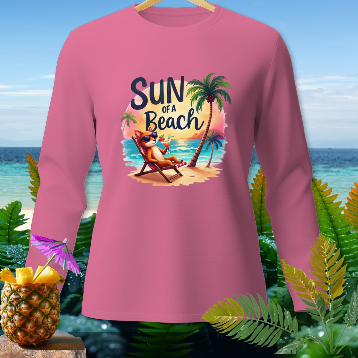 Pink long-sleeve shirt with "Sun of a Beach" graphic of a fox on a lounge chair.