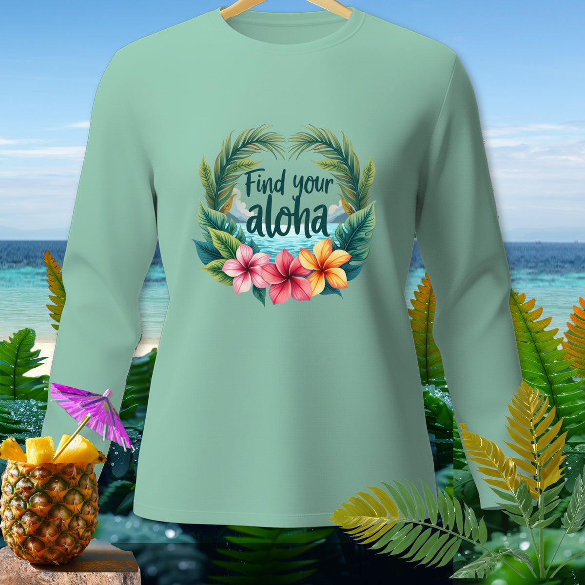 Light green long-sleeve shirt with "Find your aloha" floral design.