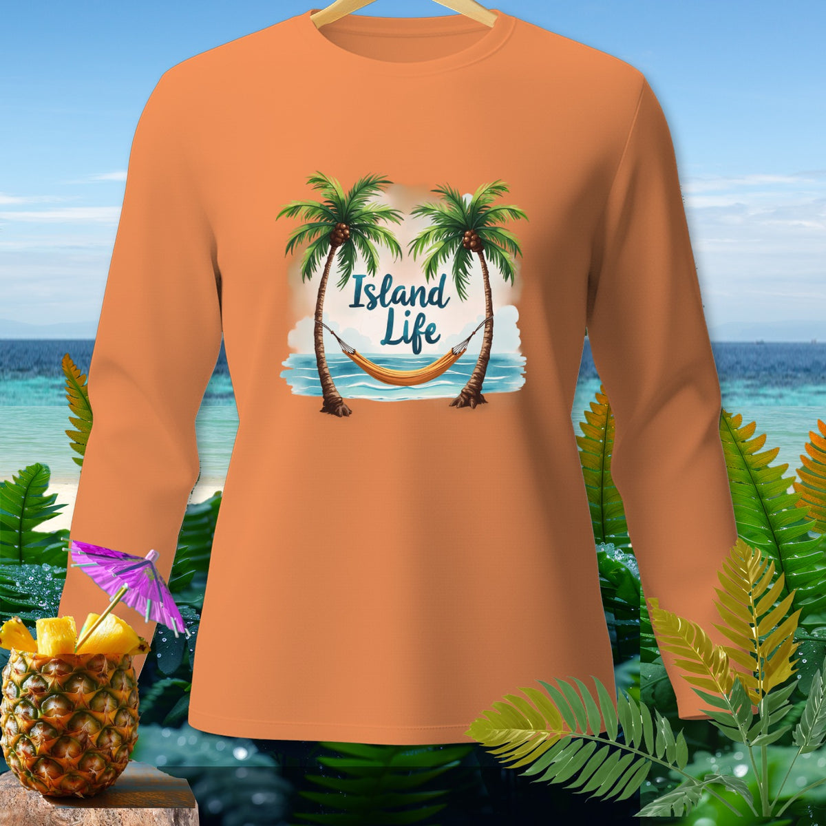Orange long-sleeve shirt with "Island Life" text, palm trees, and hammock graphic.
