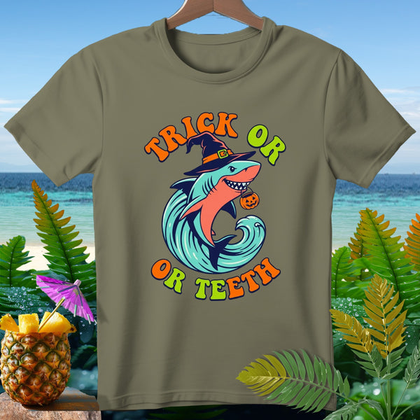 Shark with witch hat and pumpkin trick or teeth Halloween graphic on a tan t-shirt.