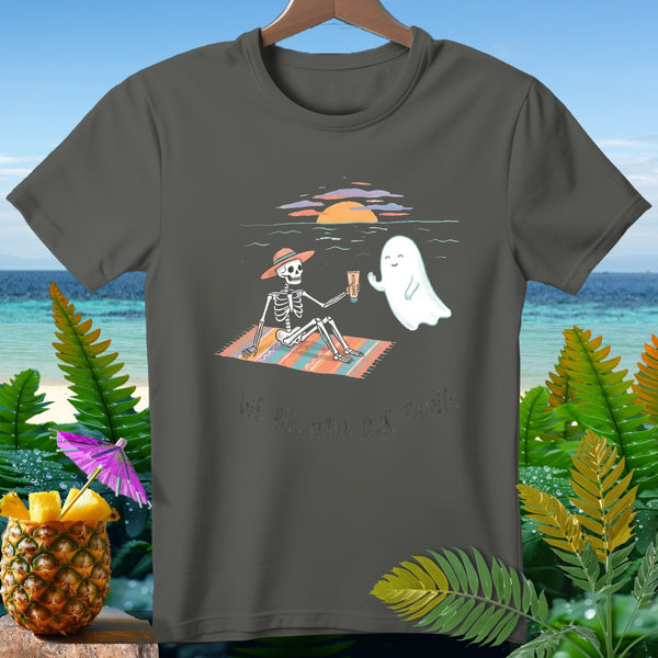 Skeleton and ghost on beach blanket with sunscreen, text "We all have our thing."