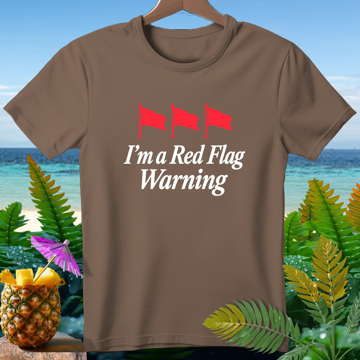Brown t-shirt with red flags and "I'm a Red Flag Warning" text.