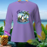 Lavender long-sleeve shirt with a cartoon penguin wearing sunglasses and text 