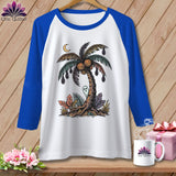 White raglan t-shirt with a Halloween-themed palm tree graphic featuring pumpkins, bats, and a ghost.