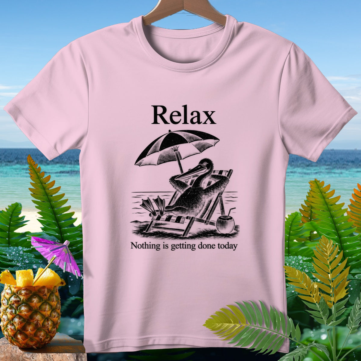 Pink t-shirt with text "Relax" and a pelican on a beach chair.