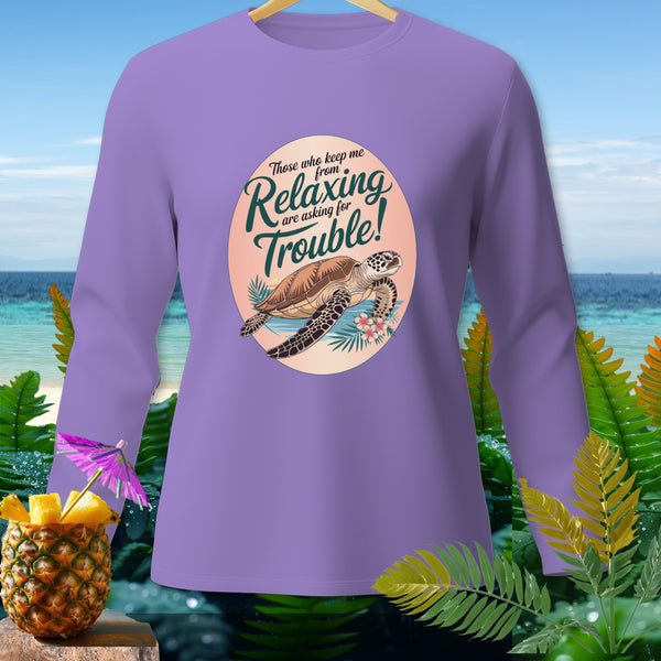 Purple long-sleeved shirt with a graphic of a sea turtle and text that reads "Those who keep me from Relaxing are asking for Trouble!"