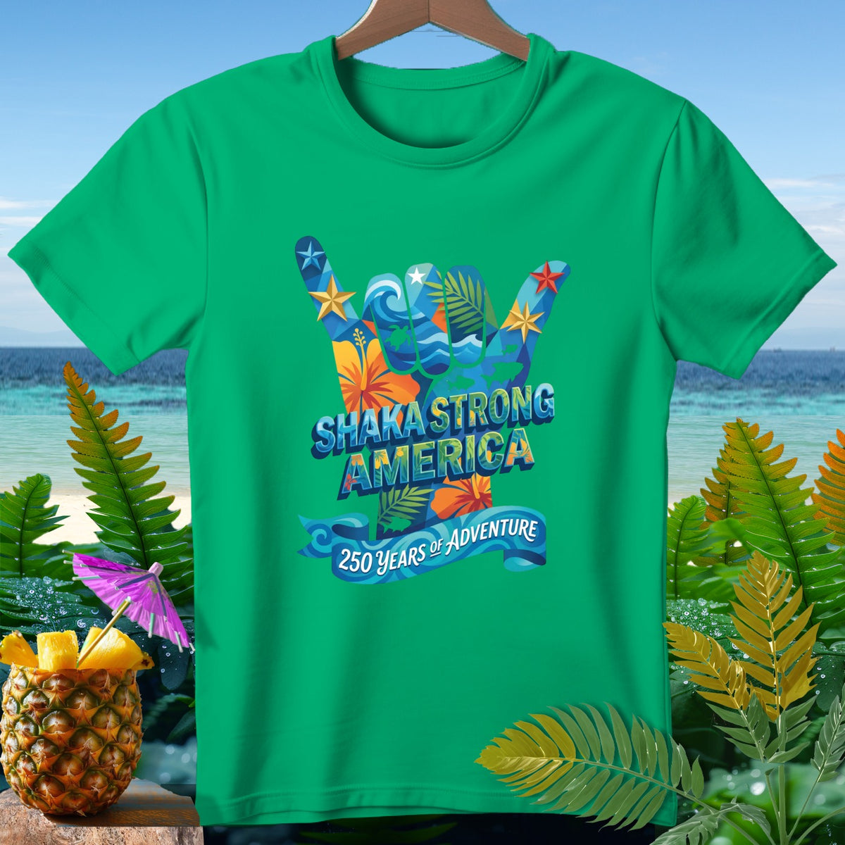 Green t-shirt with "Shaka Strong America 250 Years of Adventure" graphic.
