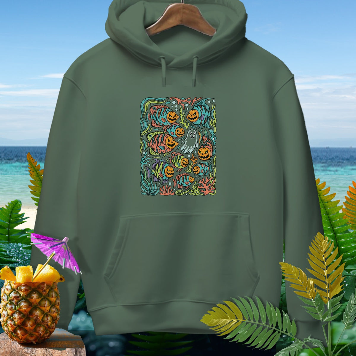 Green hoodie with a Halloween-themed underwater print of fish and pumpkins.