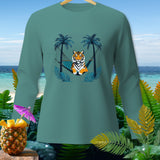 Tiger lounging in a hammock between palm trees on a teal long-sleeved shirt.